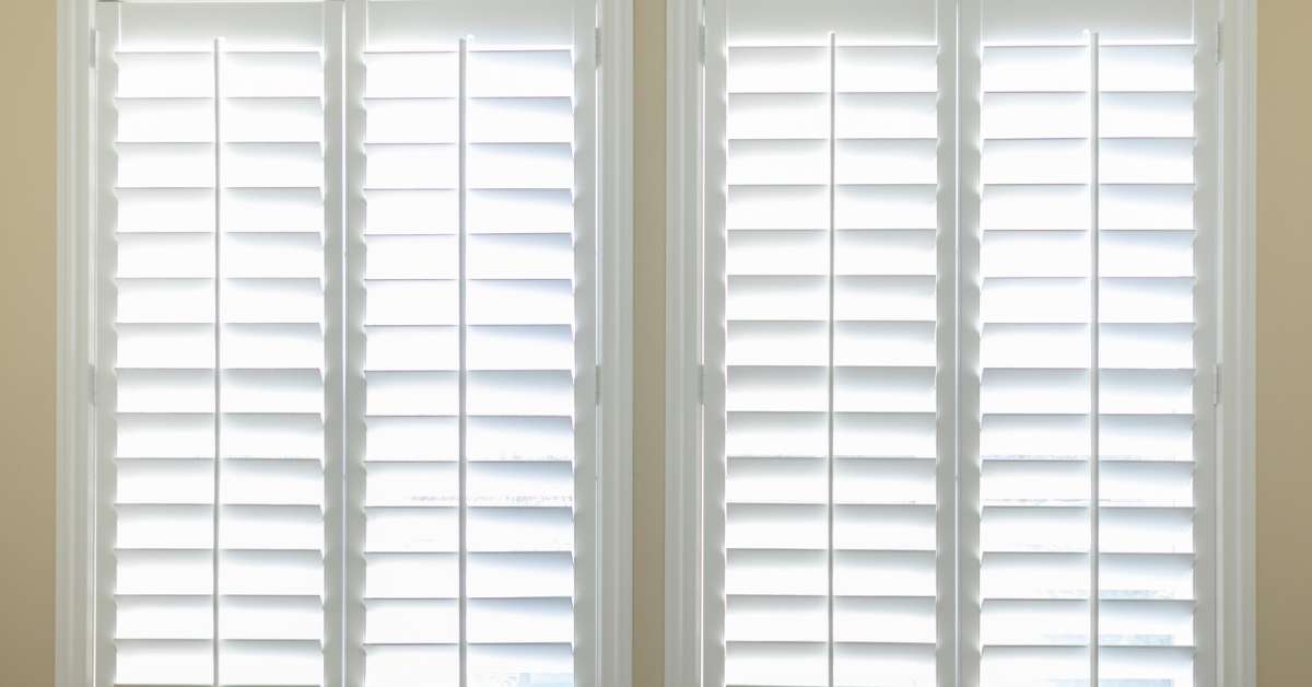 Classic white plantation shutters for timeless appeal