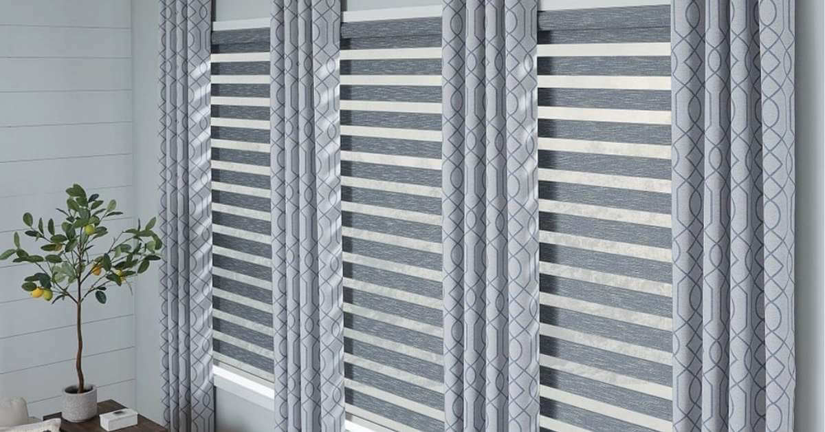 Graber layered shades enhancing the natural light in the living room.
